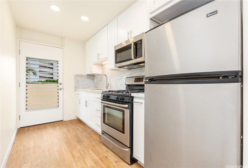 Your remodeled kitchen awaits just inside the front door.