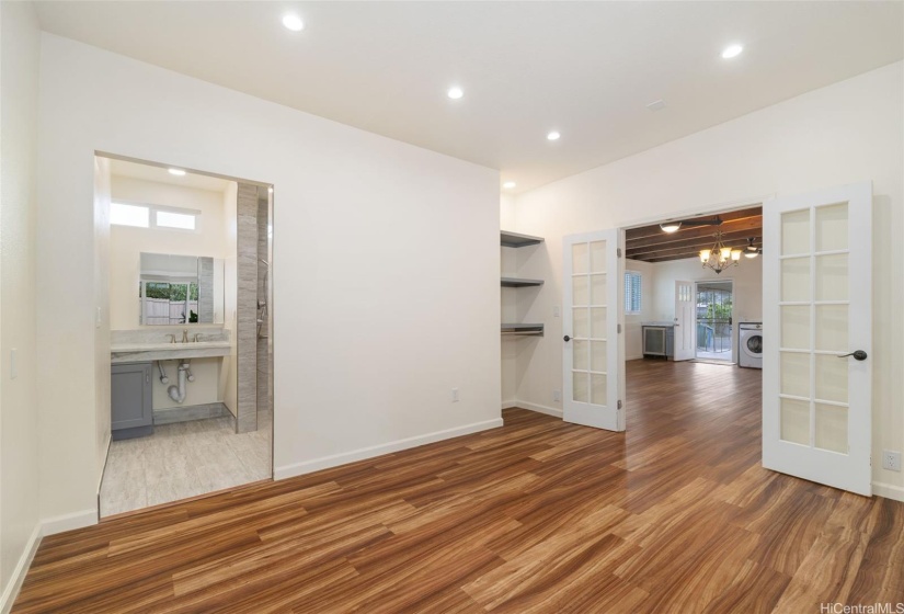 Lower level bedroom opens directly into living room.