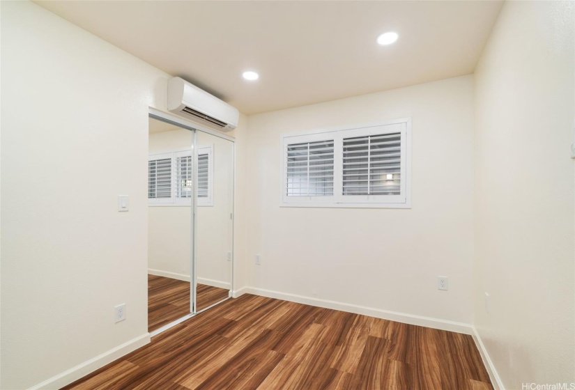 Upper level second bedroom with split AC.