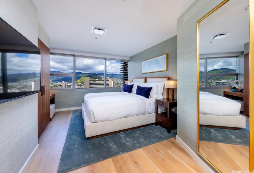 Second level bedroom with ensuite bath and views of the Koolau Mountains.