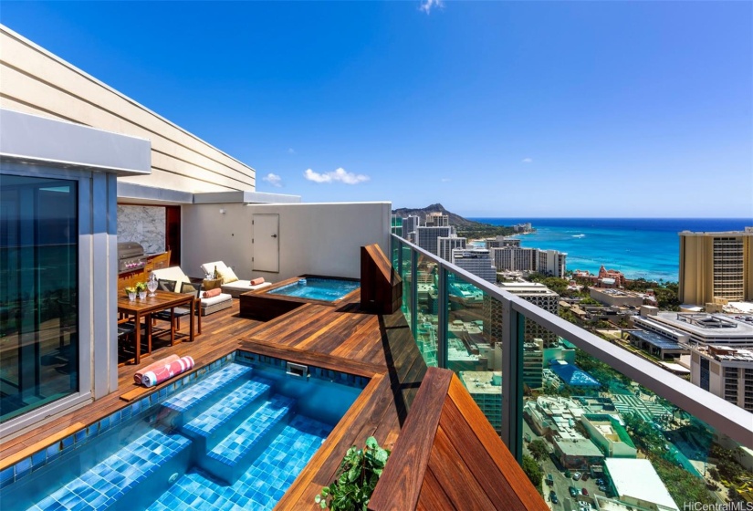 Your own private rooftop lanai with pool, hot-tub, barbecue, and views of paradise.