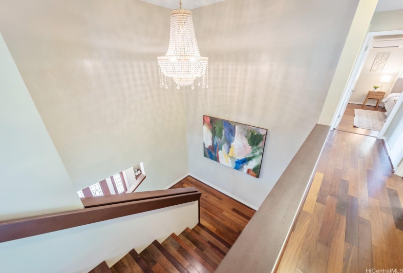 Staircase with chandelier