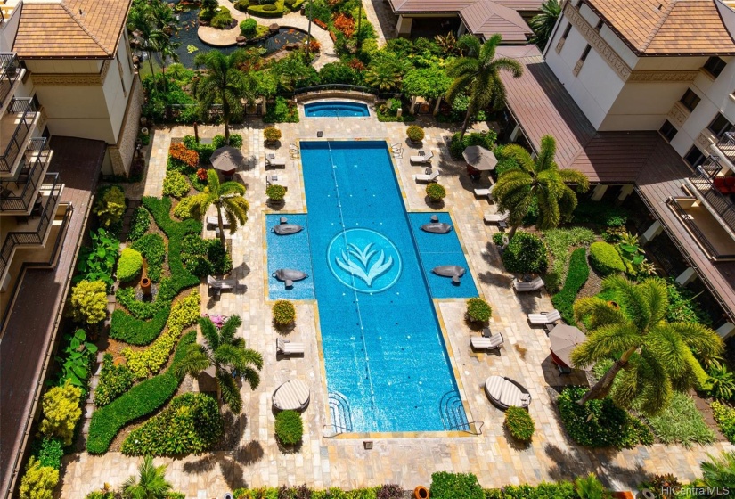 View of the lap pool (not from the unit) showing the beautiful landscape surrounding and whirlpool spa.