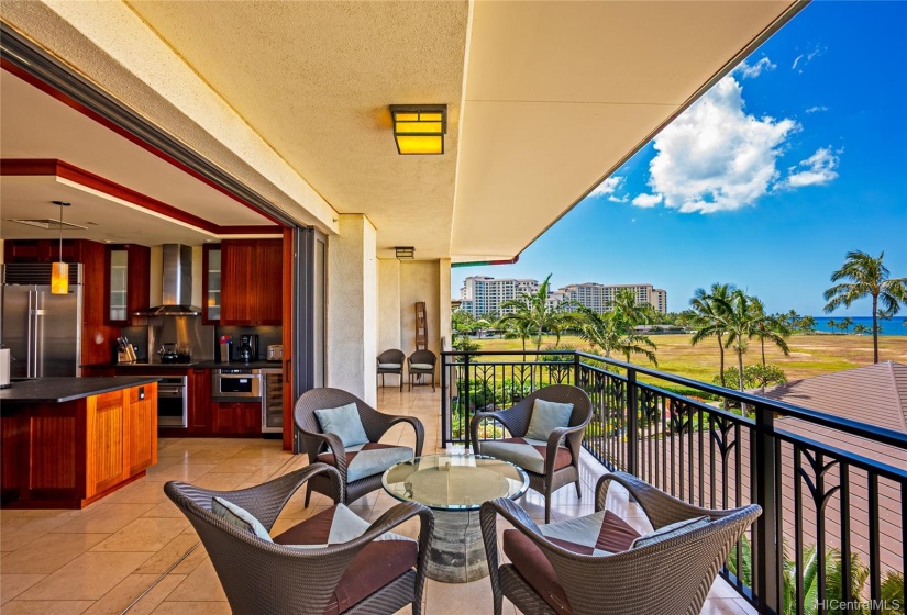 Ocean, sunset and garden views from the spacious Villa and open air covered lanai area, blending indoor and outdoor living.