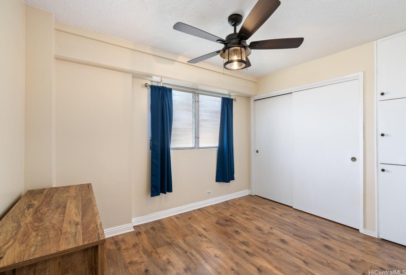 2nd bedroom with lots of storage space.