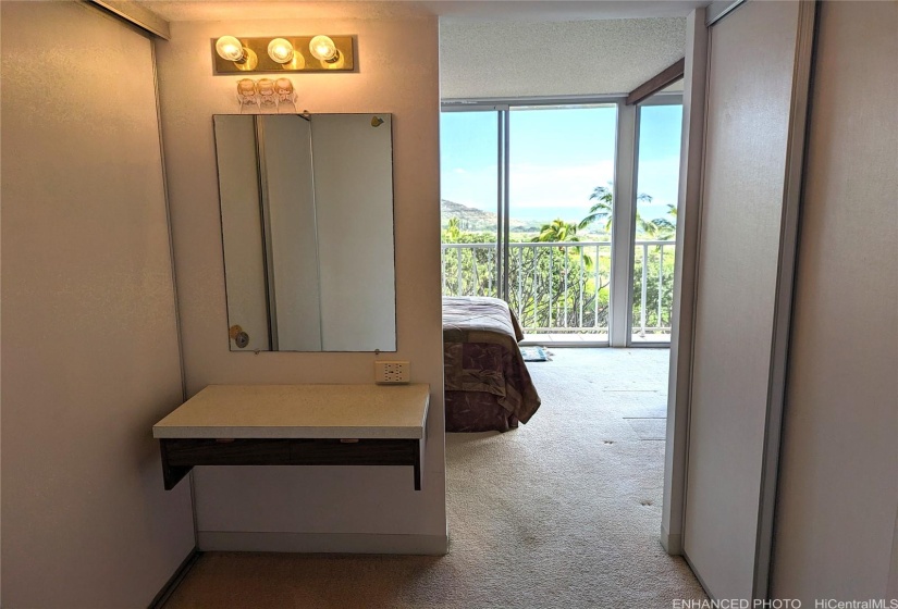 Dressing room between the bathroom and bedroom. Enhanced.