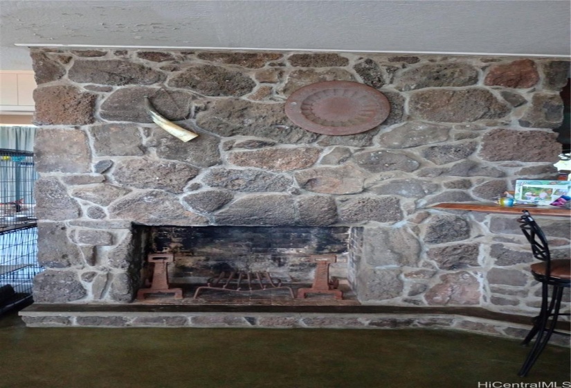 focal point of the house is the lava rock fireplace