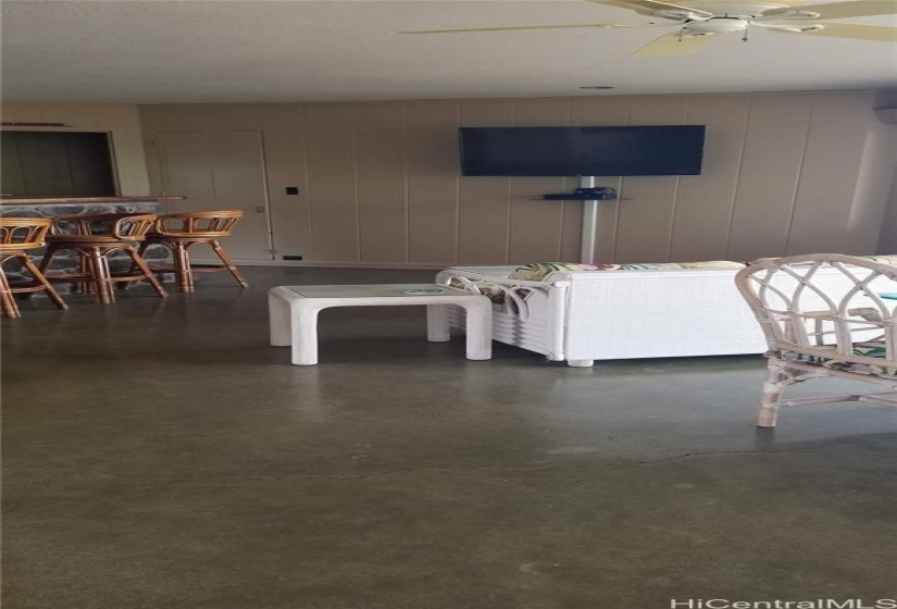 upstairs living room - note the cement floors