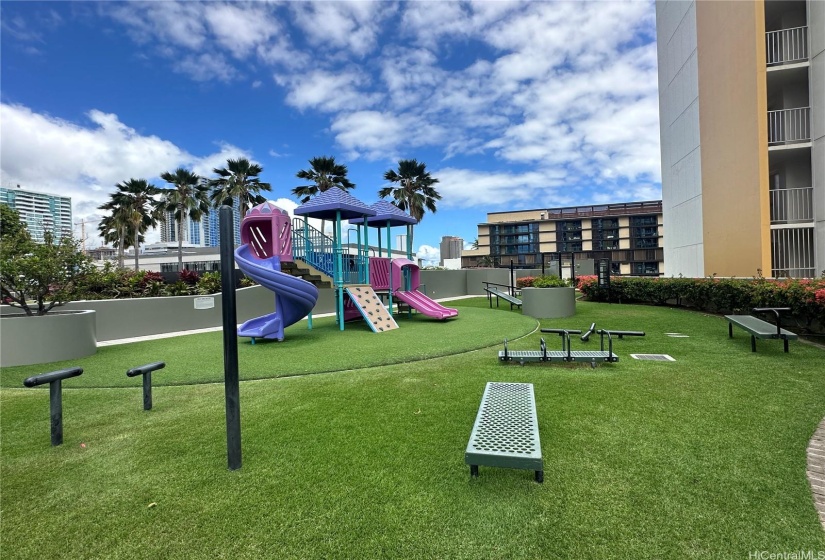 Playground and Outdoor Exercise Area near Pool