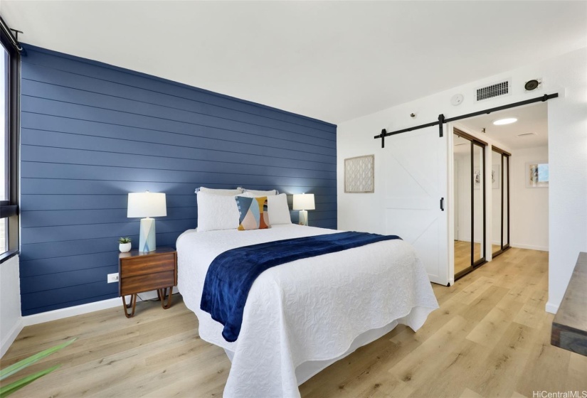 Primary Bedroom with ensuite bathroom, mirrored closets