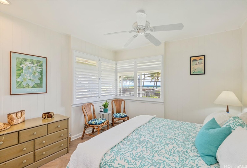 Primary bedroom with ocean views.