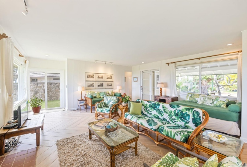 Livingroom with lots of natural light and space to relax.