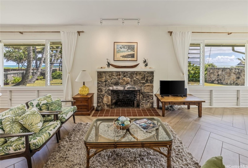 The original lava rock chimney is a focal point of the livingroom.