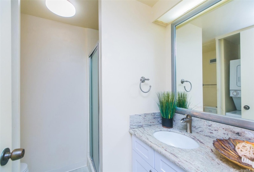 Guest bath with washer & dryer.