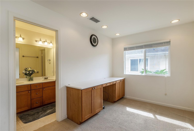 Upstairs office/den area between bathroom and bedroom.