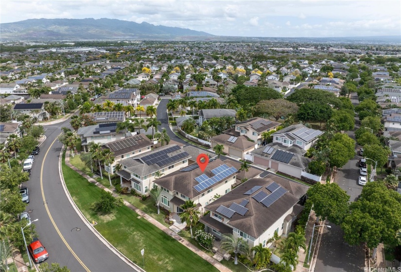 Arial view of home and mountains.