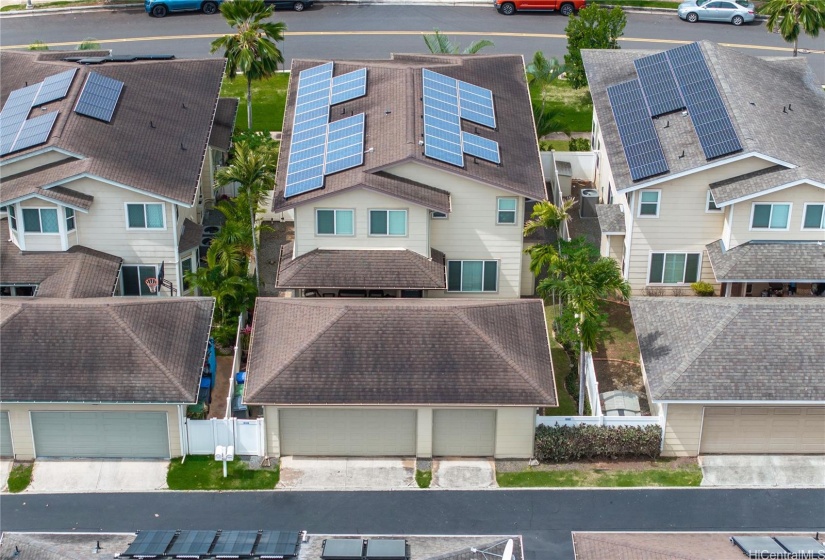 Arial view of 3 car garage, and back of home.