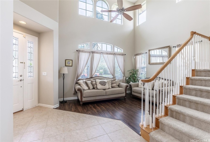 Living room entry view of home, by staircase.