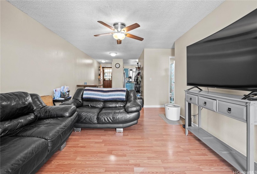 Living Room facing Dining Area, Kitchen and Entry Way.