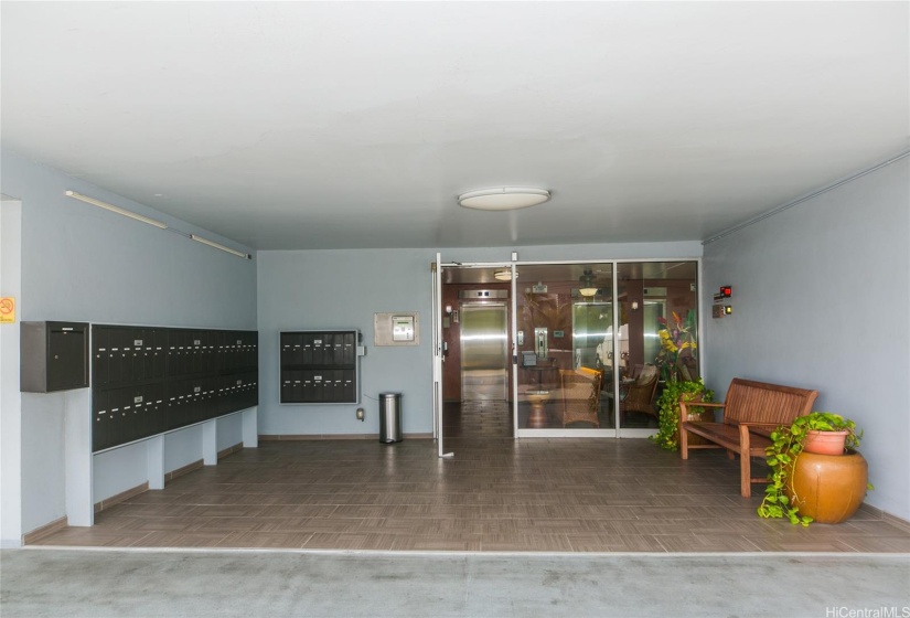 Mailboxes on the left side of building entrance