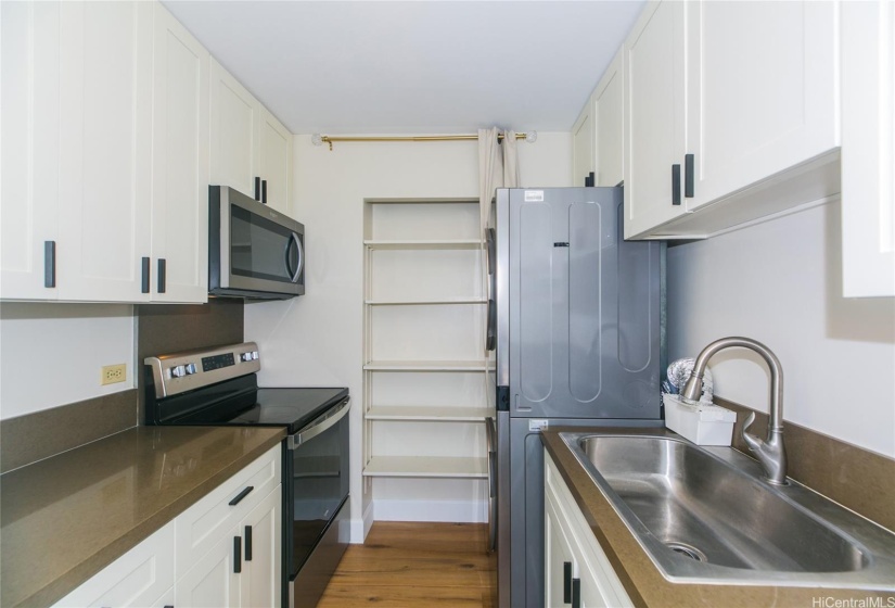 Kitchen with SS Appliances and Pantry