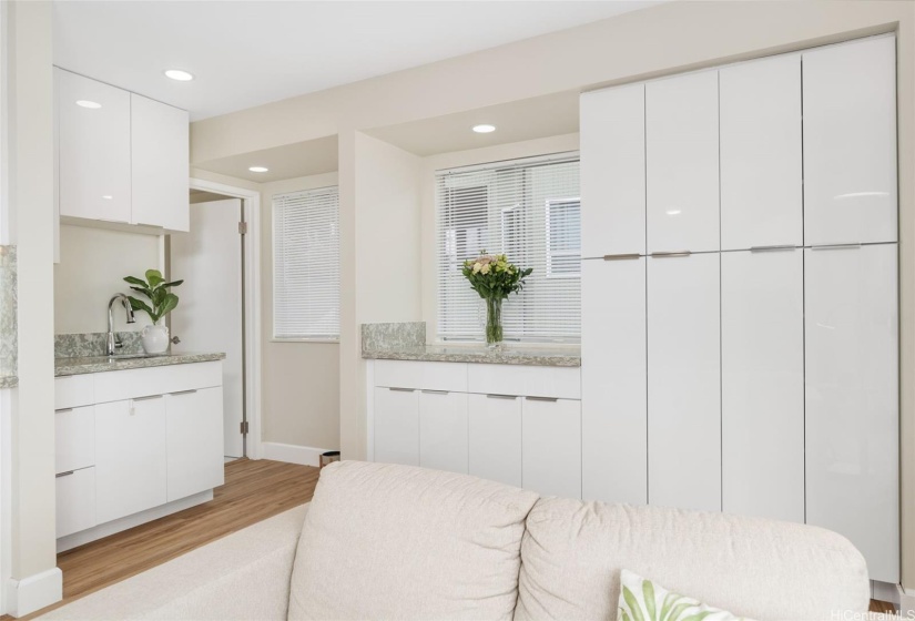 Serve a cocktail from the wet bar. There's plenty of pantry storage to keep you organized!