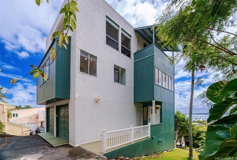 2 car garage with remotes. Extra refrigerator. Plenty of storage and shelving for your tools.