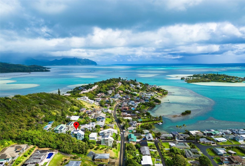 Perched above Kaneohe Bay on Lilipuna Rd, surround with lush greenery.