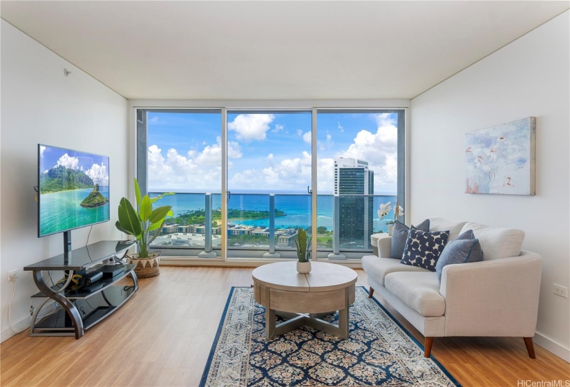 Preferred layout with the bedrooms on the either side of the living room. Floor-to-ceiling windows, lanai, and breathtaking views. Must see to appreciate.