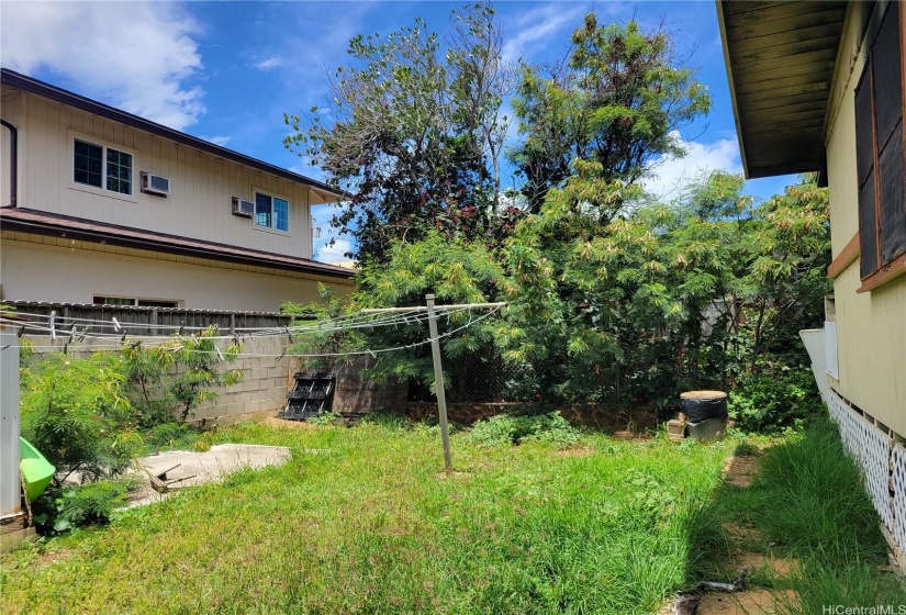 Even with 2 houses and a large carport on the lot, there is still more land for yard space.