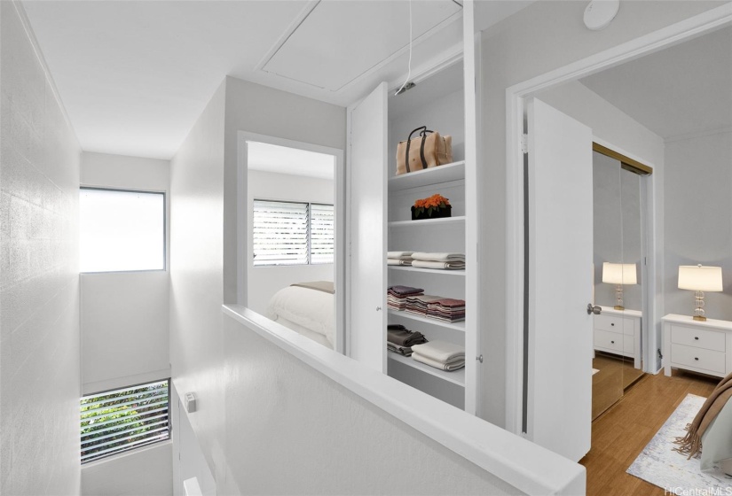 Second level offers ample closets and favorable layout. This photo is virtually staged.