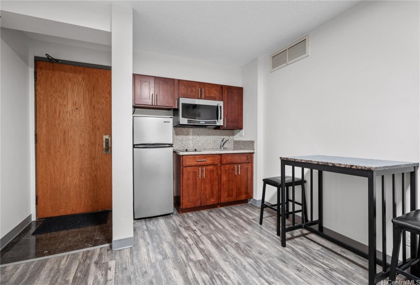 entry door/kitchen/dining area