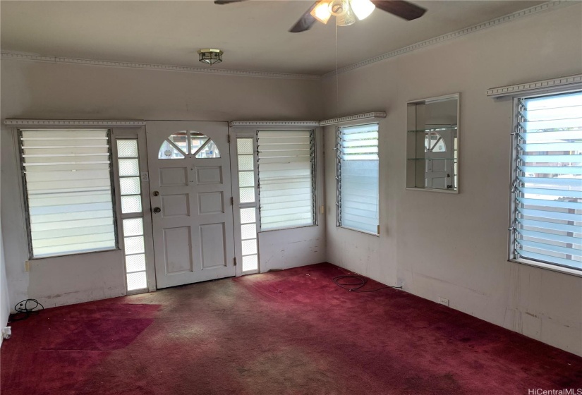 Unit 1 - Main House: Living Room with view to front door & front of house