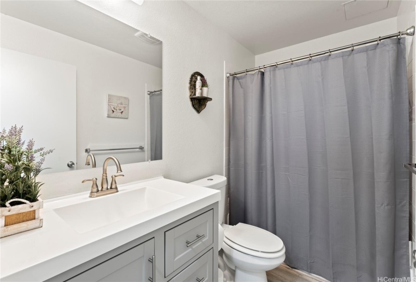 1st full bathroom with updated vanity.