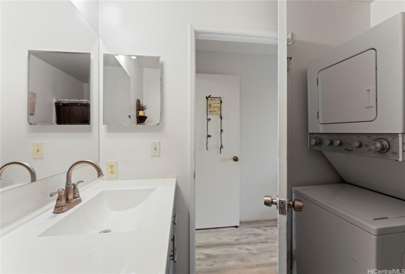 2nd full/ primary bathroom has a combo washer/dryer in unit for easy access.