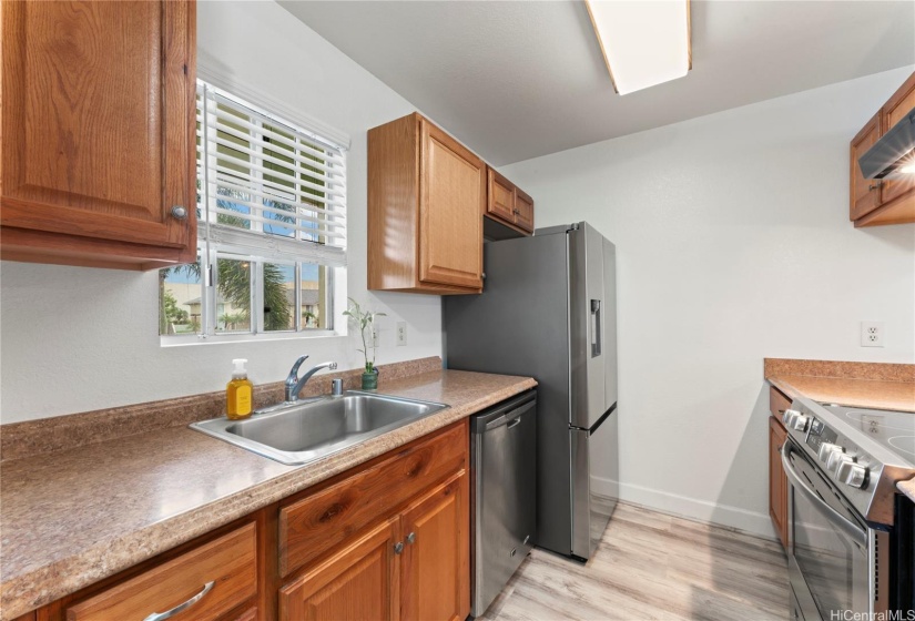 Kitchen features new appliances.