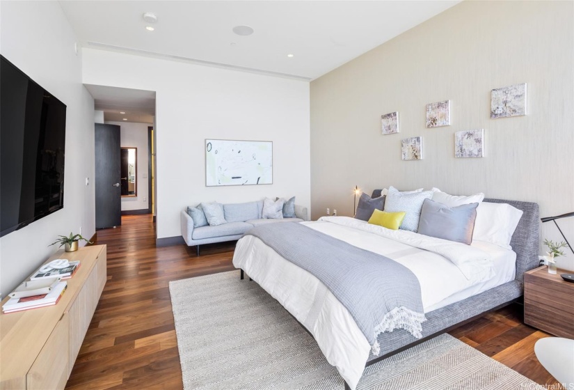 Primary bedroom with en suite and large closet area.