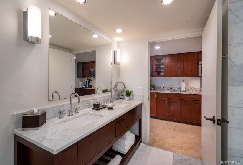 A view looking from bathroom towards kitchen. Amazing space in the heart of Waikiki!