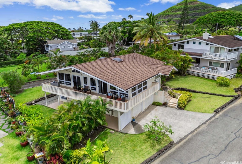 Welcome to 44-313 Kaneohe Bay Drive #B, a 4 bed, 3 bath luxury residence built in 1993 on a private lane, featuring underground electricity, with only 7 other well-maintained custom homes that all show a tremendous pride of ownership. This home has a new roof, a 4 car garage and a downstairs in-law suite. This home is located on the border of Kailua and Kaneohe with easy access to the H3 freeway making your work and school commutes seamless and fast.  This home offers plenty of indoor space and over 700 sf of lanai space for taking in the stunning Kaneohe Bay and Ko'olau mountain views.  The low-maintenance landscaping provides privacy and level terraced areas for enjoying the outdoors.