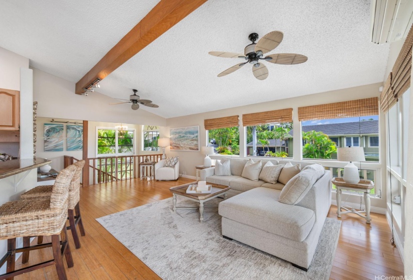 High ceilings in the living room and plenty of windows to take in the views, sunlight and tradewind breezes.  This room has a split AC unit, tinted windows and bamboo flooring.