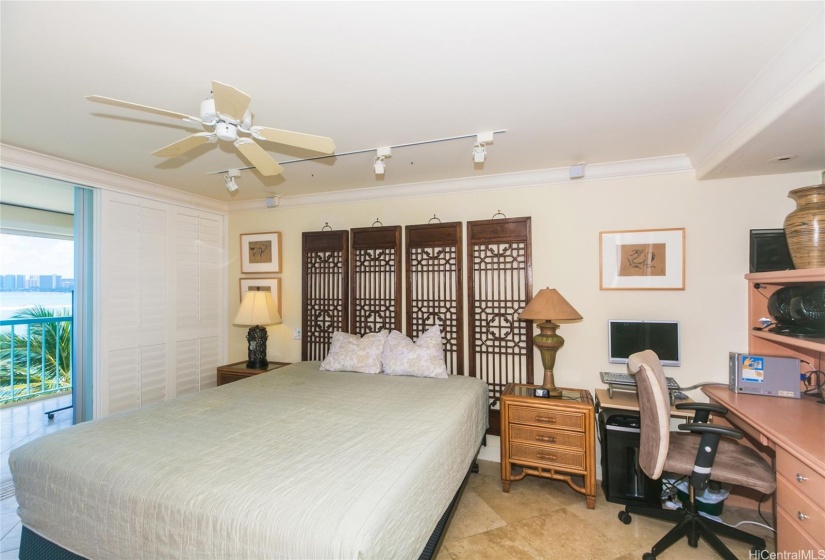 This large bedroom is big enough to have an office space.