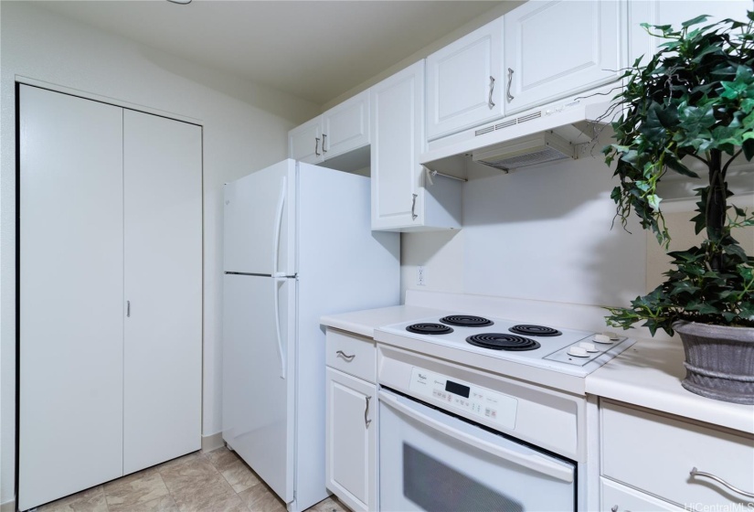 Kitchen and large storage pantry.