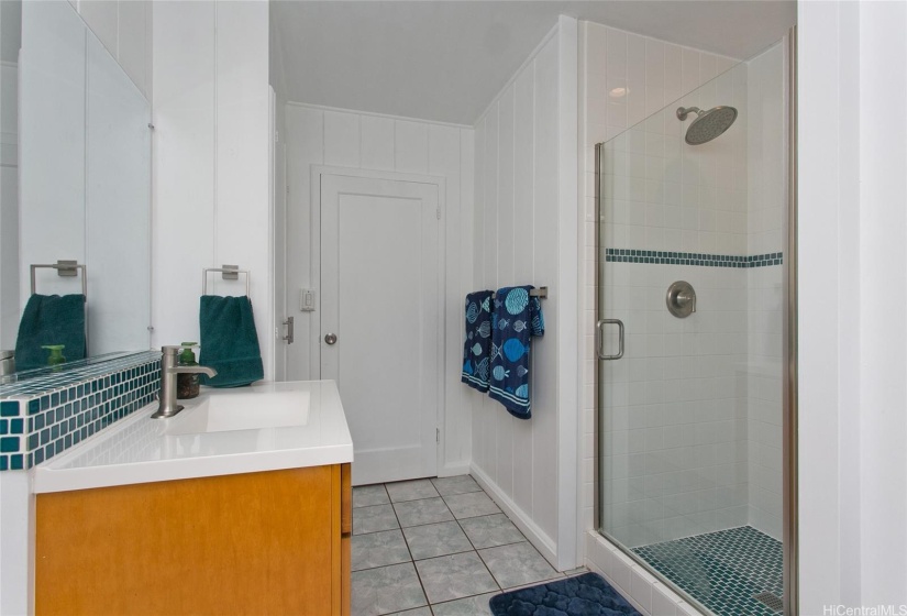 Hall Bath connects to Bdrm 2 and has exterior door for pool access