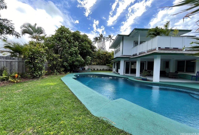 Heated Blue Tiled Pool, and BBQ Lanai in back garden