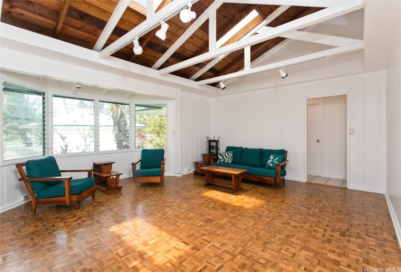 living Room with Open Beam ceiling and Teak Floors