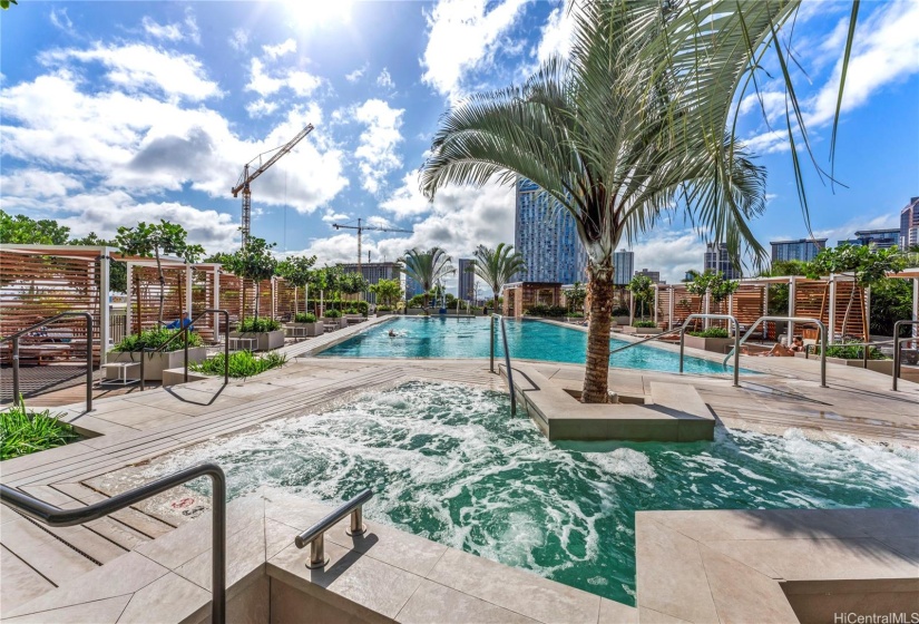 Jacuzzi and pool area for relaxation