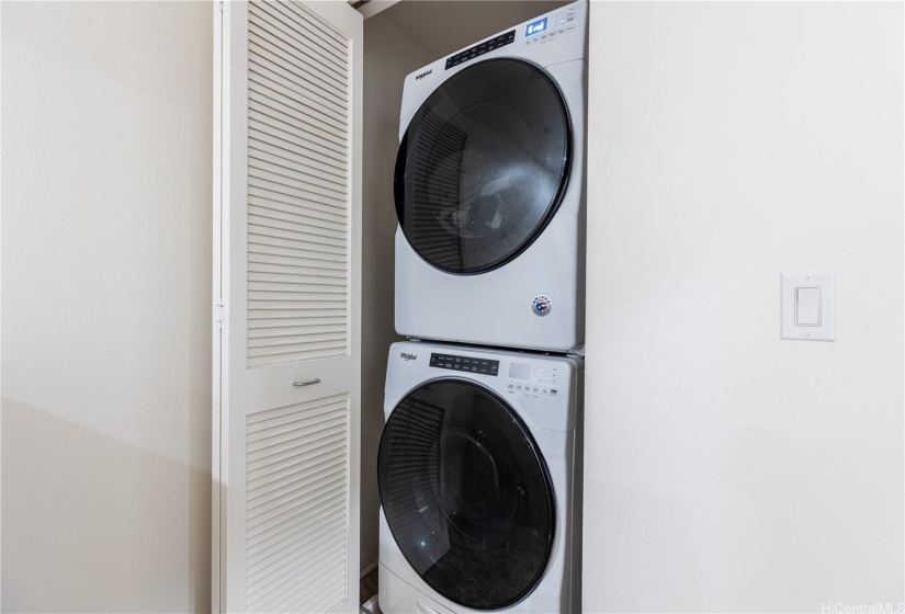 Full-size, front-load Washer + Dryer located in the upstairs Hallway.