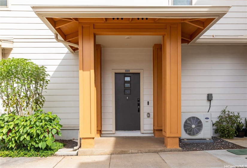 Front door is found at the back of the building.