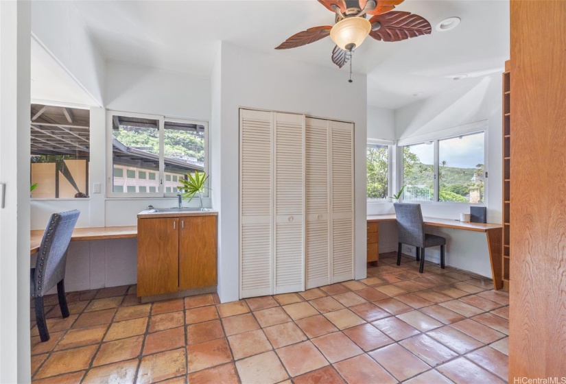 Office and laundry room with full bathroom off of kitchen.