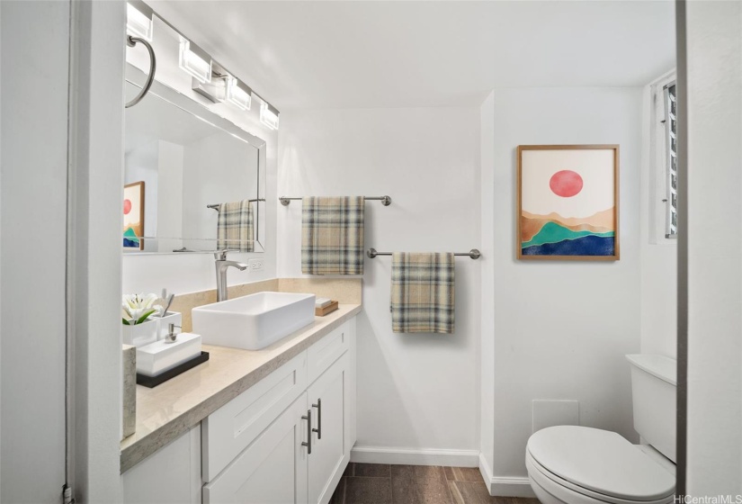 Fully remodeled bathrooms. Photo is virtually Staged. Waikiki Hawaii